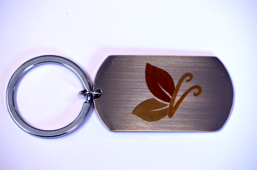 Schlüsselanhänger mit Schmetterling Logo Schlüsselanhänger mit Schmetterling Logo